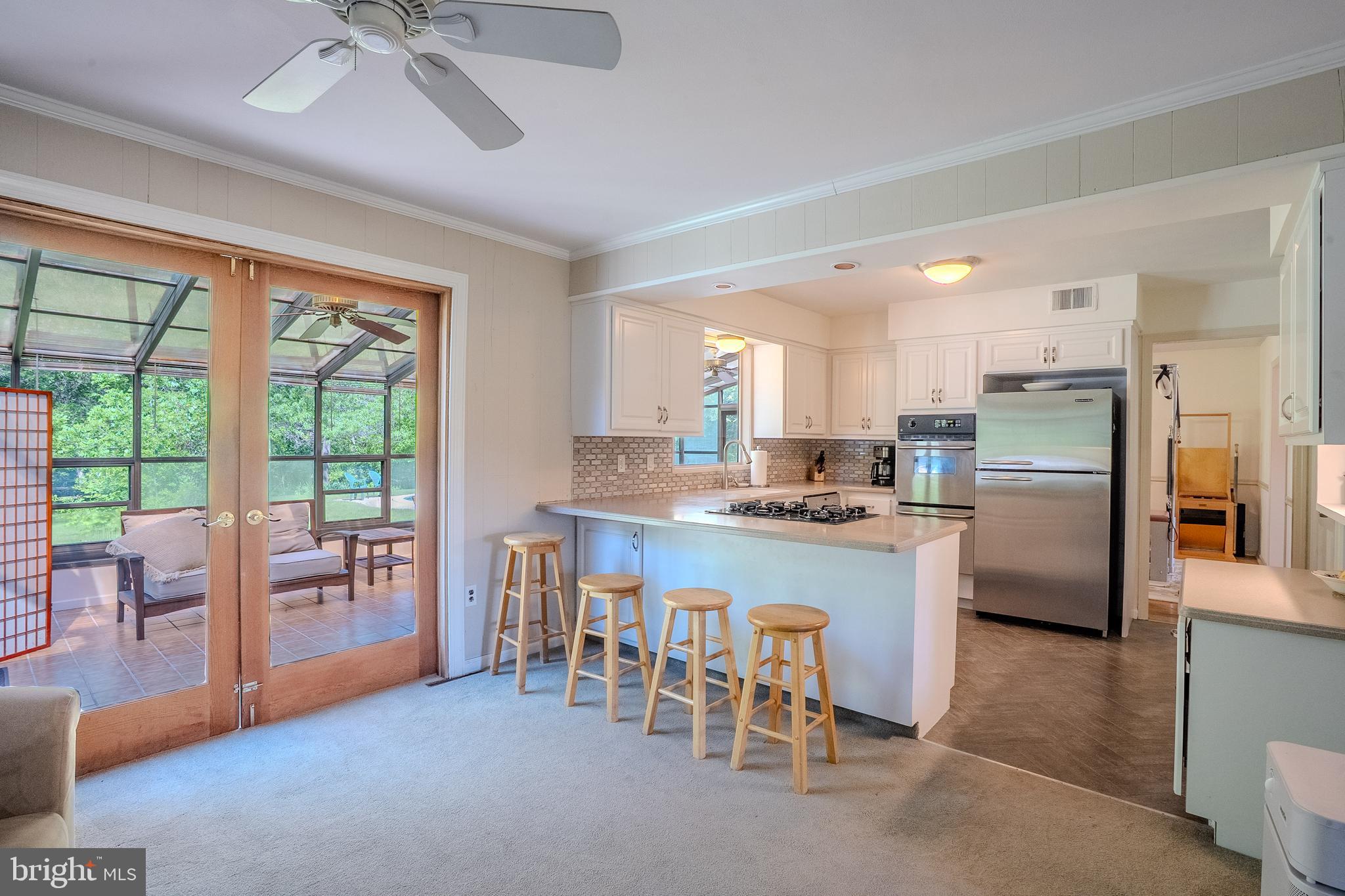 1165 Bear Tavern Road Titusville, NJ 08560 - Photo 23 of 47 family room to kitchen and Solarium