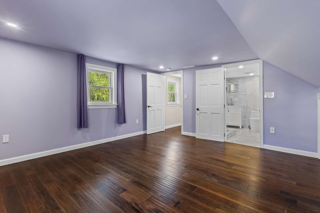 7 Darrow Street Worcester, MA 01606 - Photo 26 of 42 wooden floor in an empty room with a window
