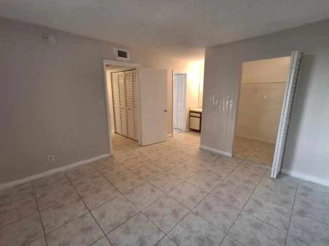 an empty room with a natural light