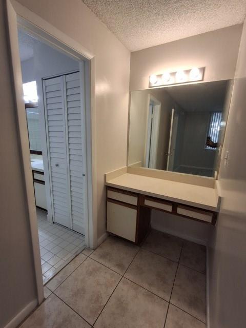741 Lyons Road, Unit 17106 Coconut Creek, FL 33063 - Photo 19 of 28 a room with counter space and entryway