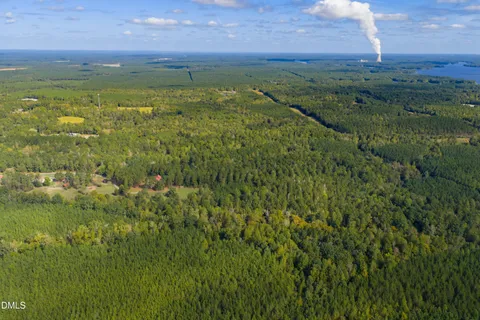 a view of a lake with a building in the background