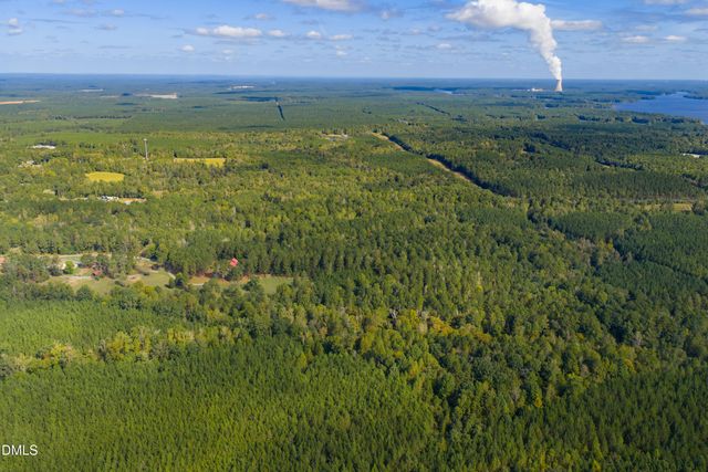 a view of a lake with a building in the background