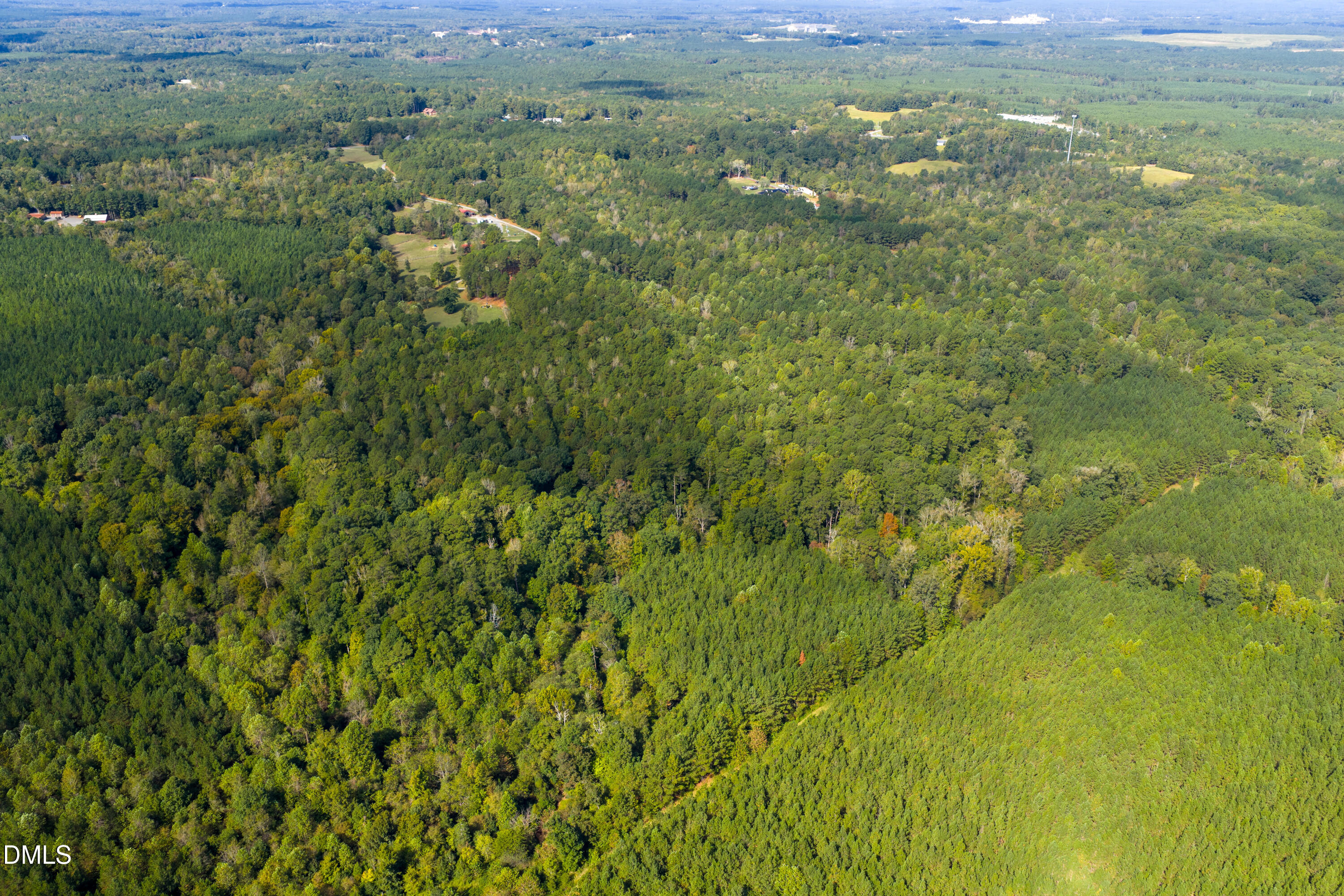262 Ellis Road Moncure, NC 27559 - Photo 24 of 30 a view of a field with an ocean