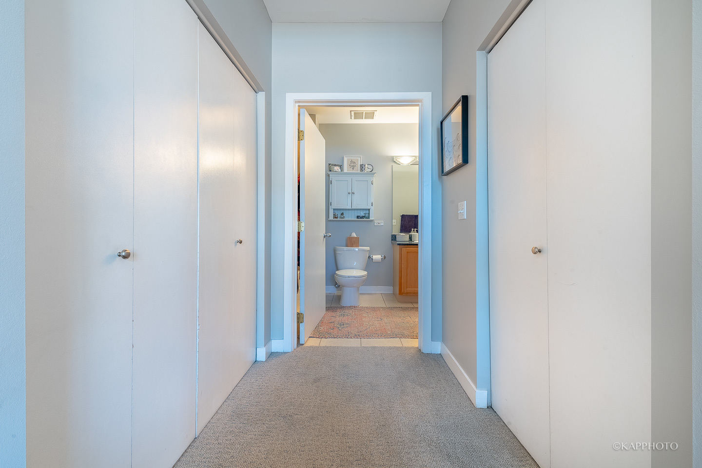 910 West Madison Street, Unit 906E Chicago, IL 60607 - Photo 21 of 26 a view of a bathroom from a hallway