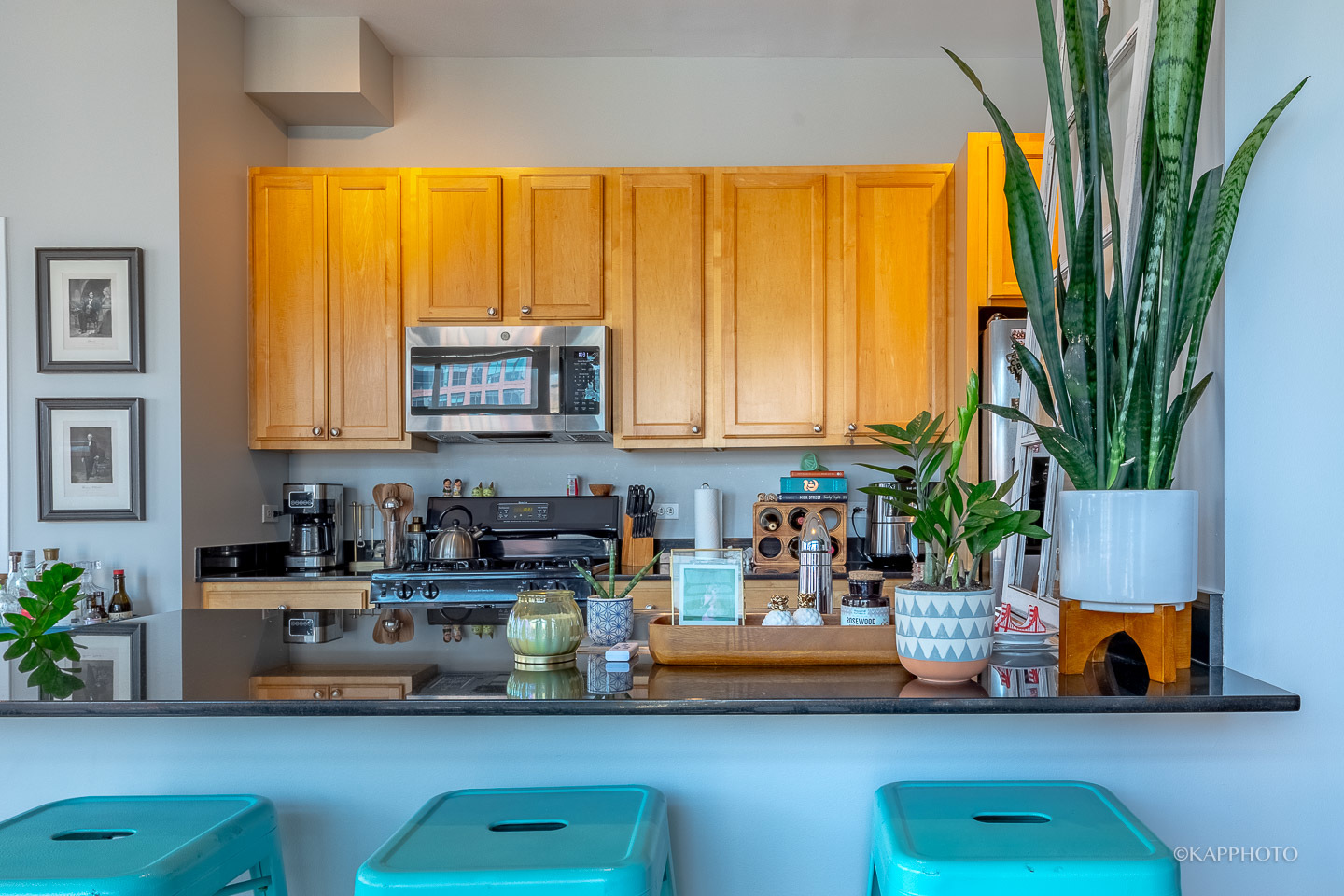 910 West Madison Street, Unit 906E Chicago, IL 60607 - Photo 9 of 26 a kitchen with a window a sink and cabinets