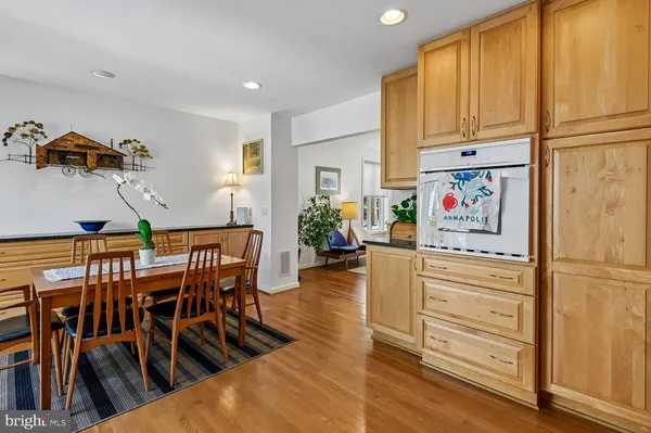 a view of a dining area with furniture window and wooden floor