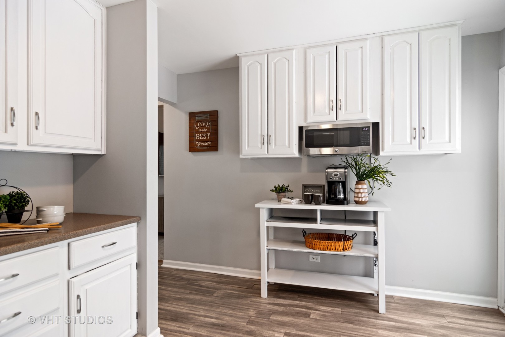 704 Cherry Valley Road Vernon Hills, IL 60061 - Photo 7 of 21 a kitchen with stainless steel appliances granite countertop white cabinets and a microwave oven