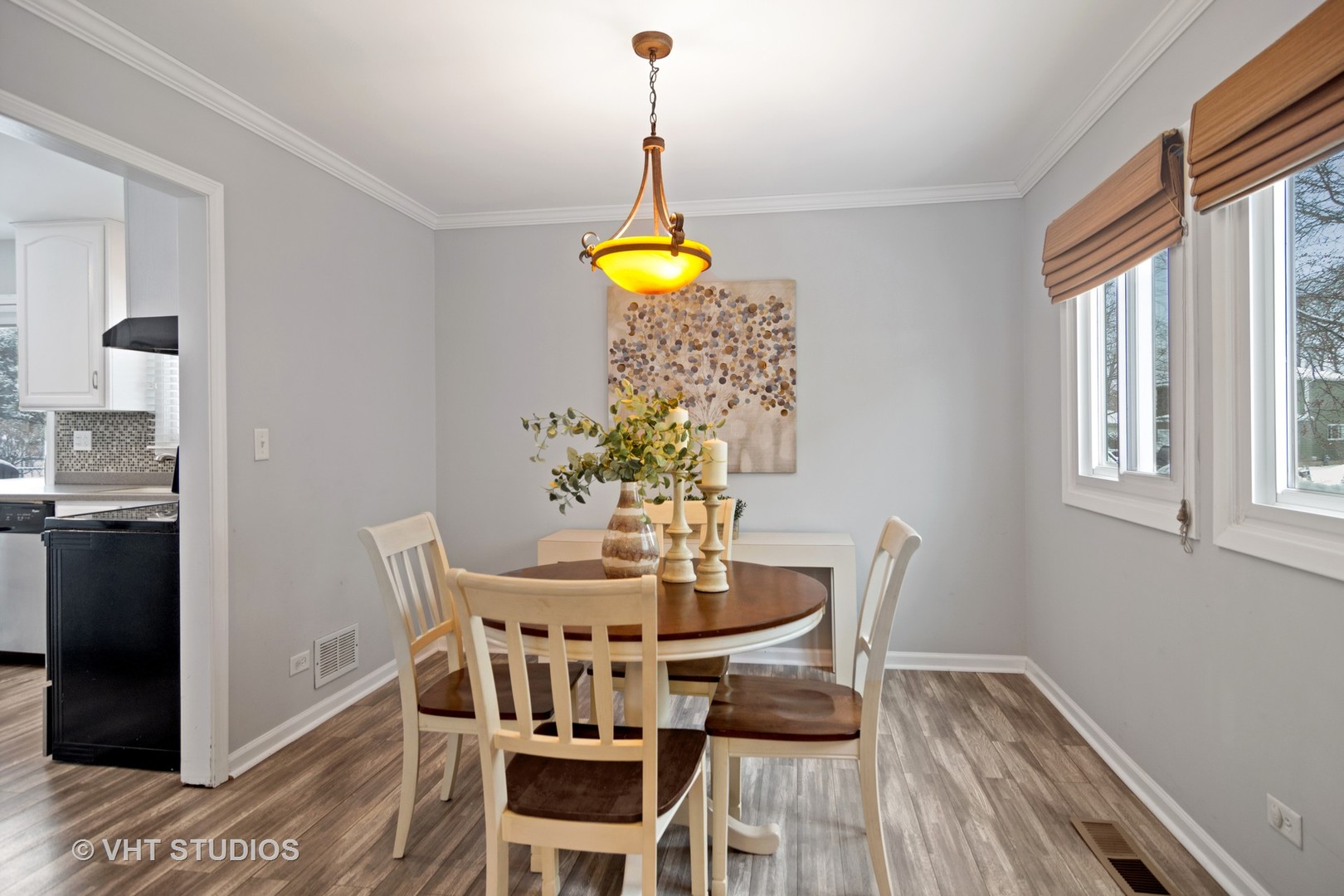 704 Cherry Valley Road Vernon Hills, IL 60061 - Photo 8 of 21 a dining room with furniture and wooden floor