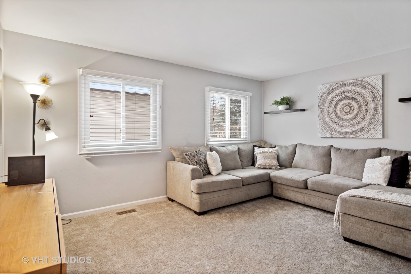 704 Cherry Valley Road Vernon Hills, IL 60061 - Photo 9 of 21 a living room with furniture and a window