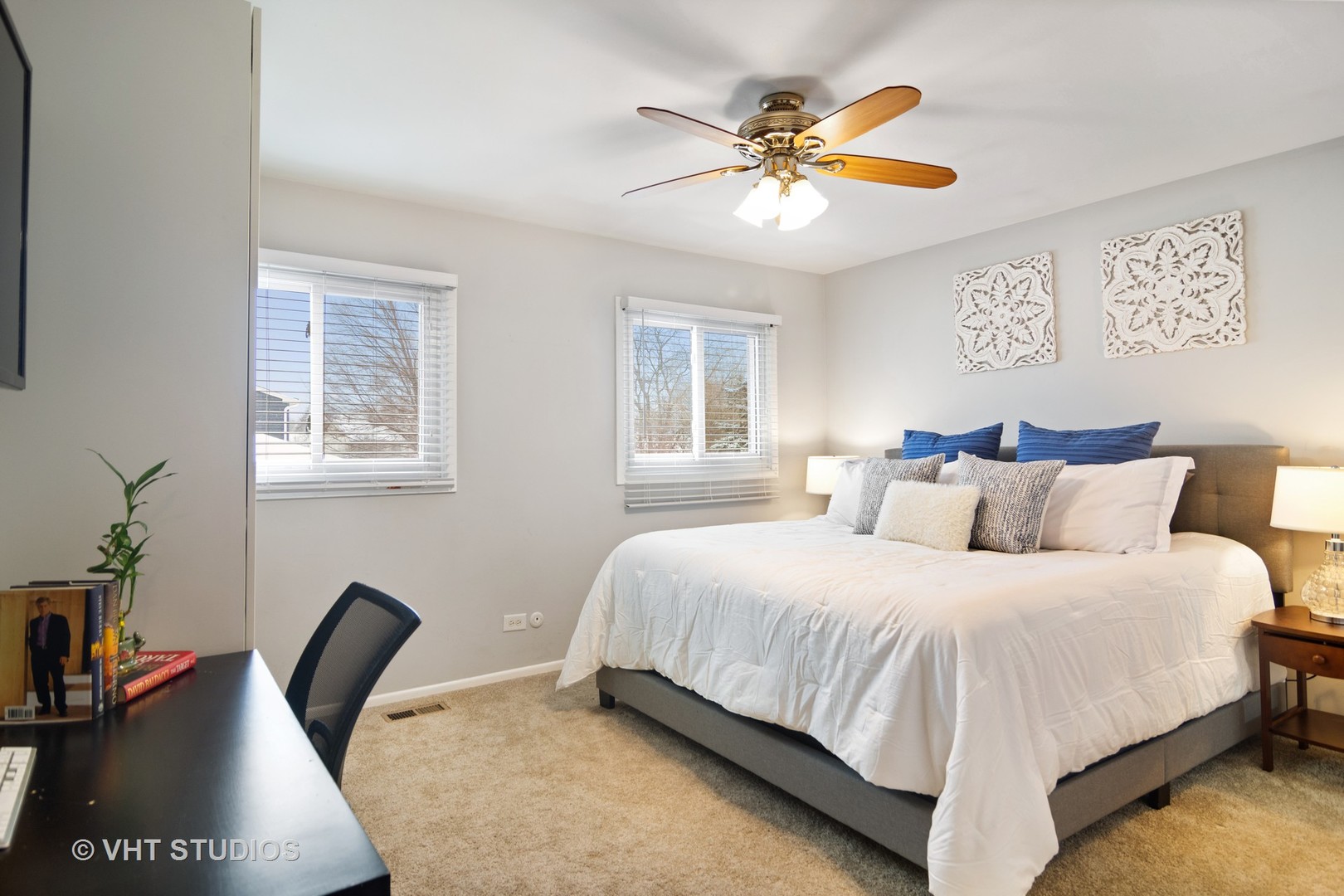 704 Cherry Valley Road Vernon Hills, IL 60061 - Photo 10 of 21 a bedroom with a bed and a chandelier