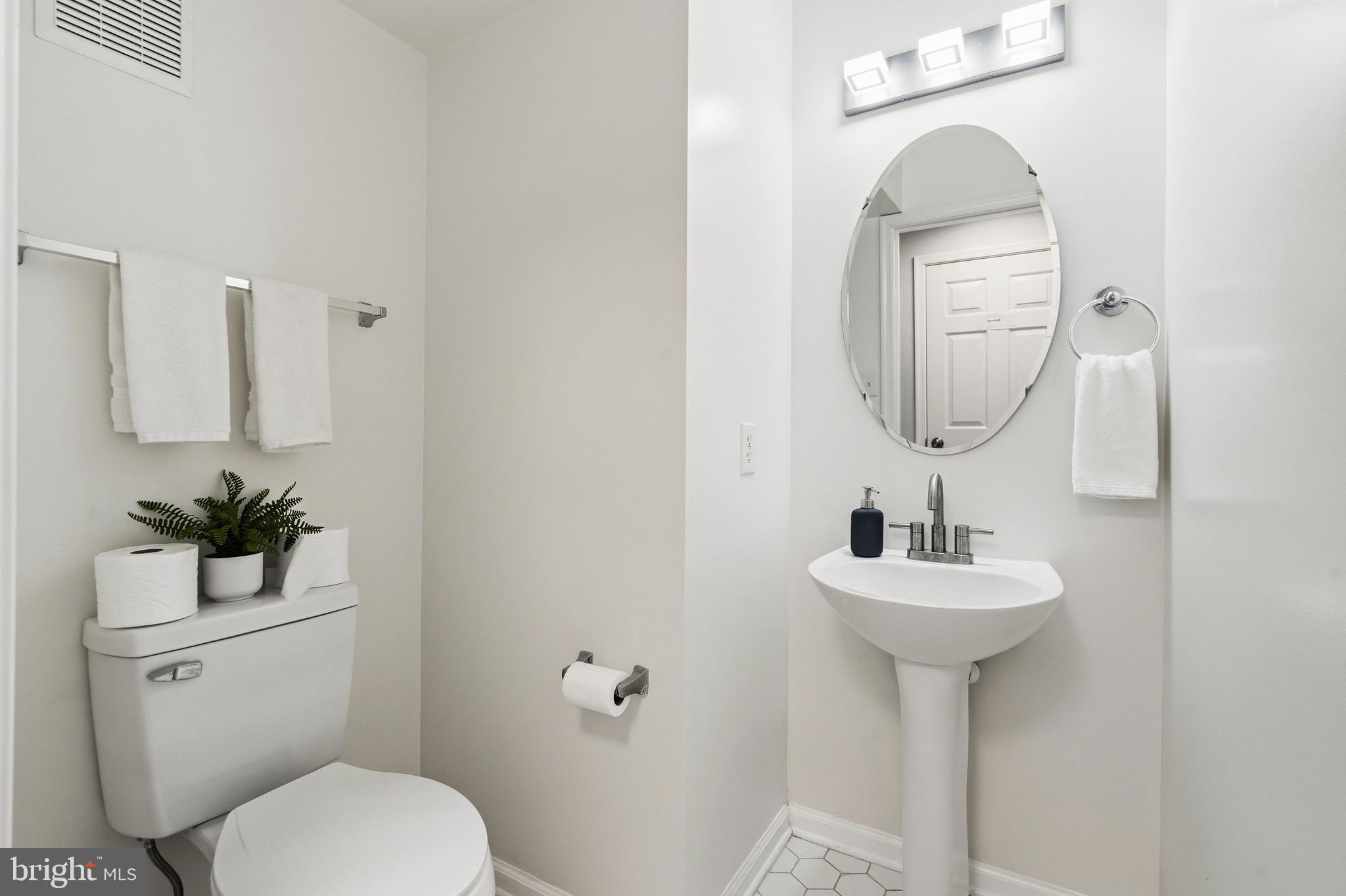 6733 Catskill Road Lorton, VA 22079 - Photo 13 of 62 Half Bathroom on main level