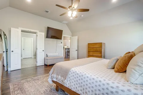 a bathroom with a granite countertop sink double and mirror