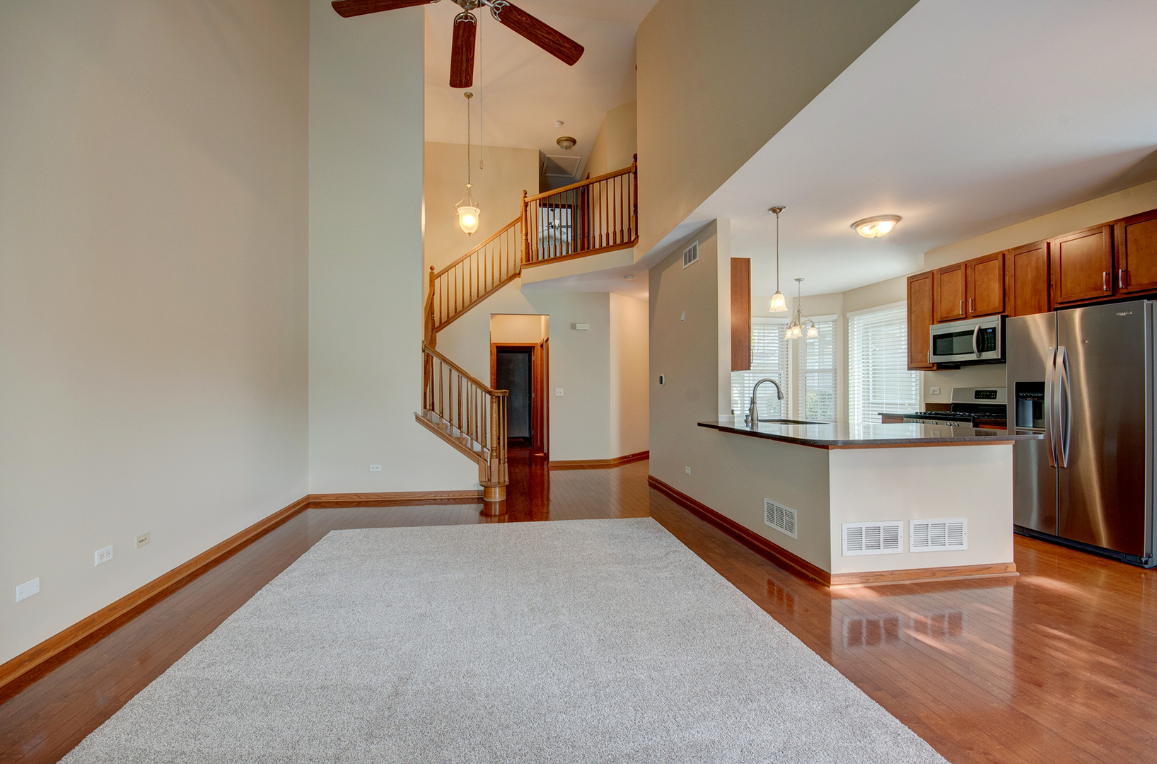 520 Frieh Drive Romeoville, IL 60446 - Photo 12 of 26 a view of kitchen with cabinets and refrigerator