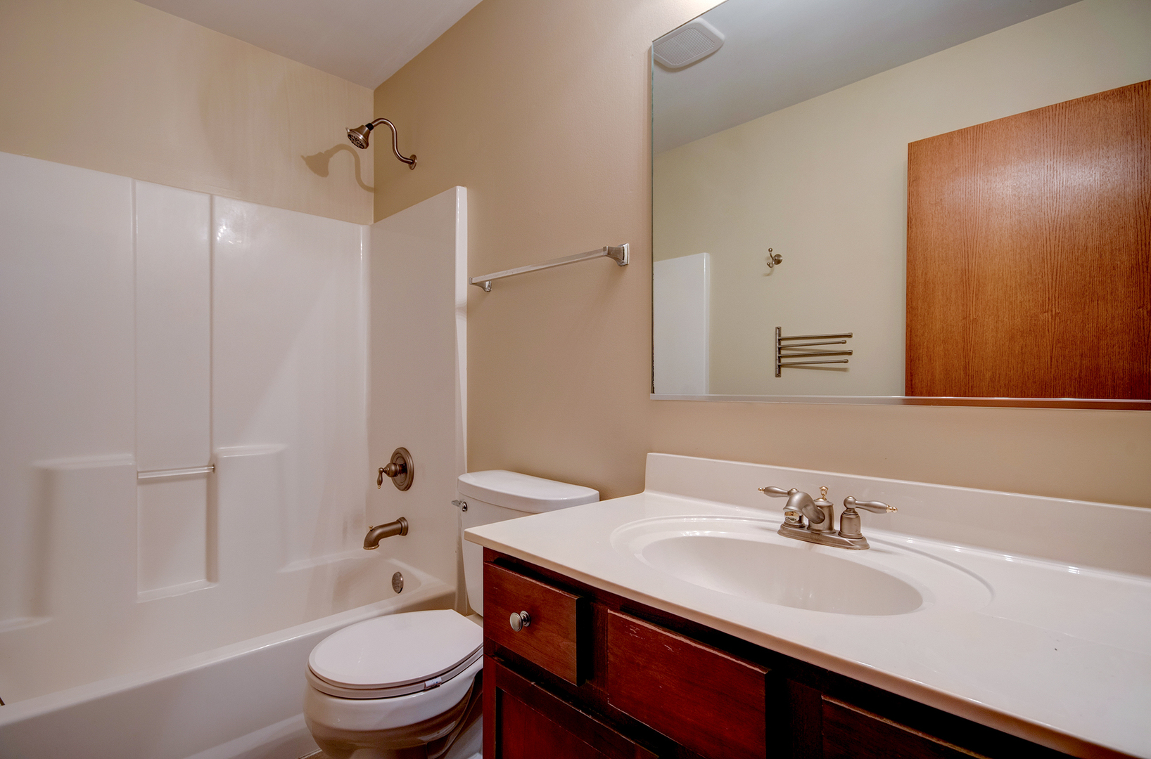 520 Frieh Drive Romeoville, IL 60446 - Photo 25 of 26 a bathroom with a sink toilet vanity and shower