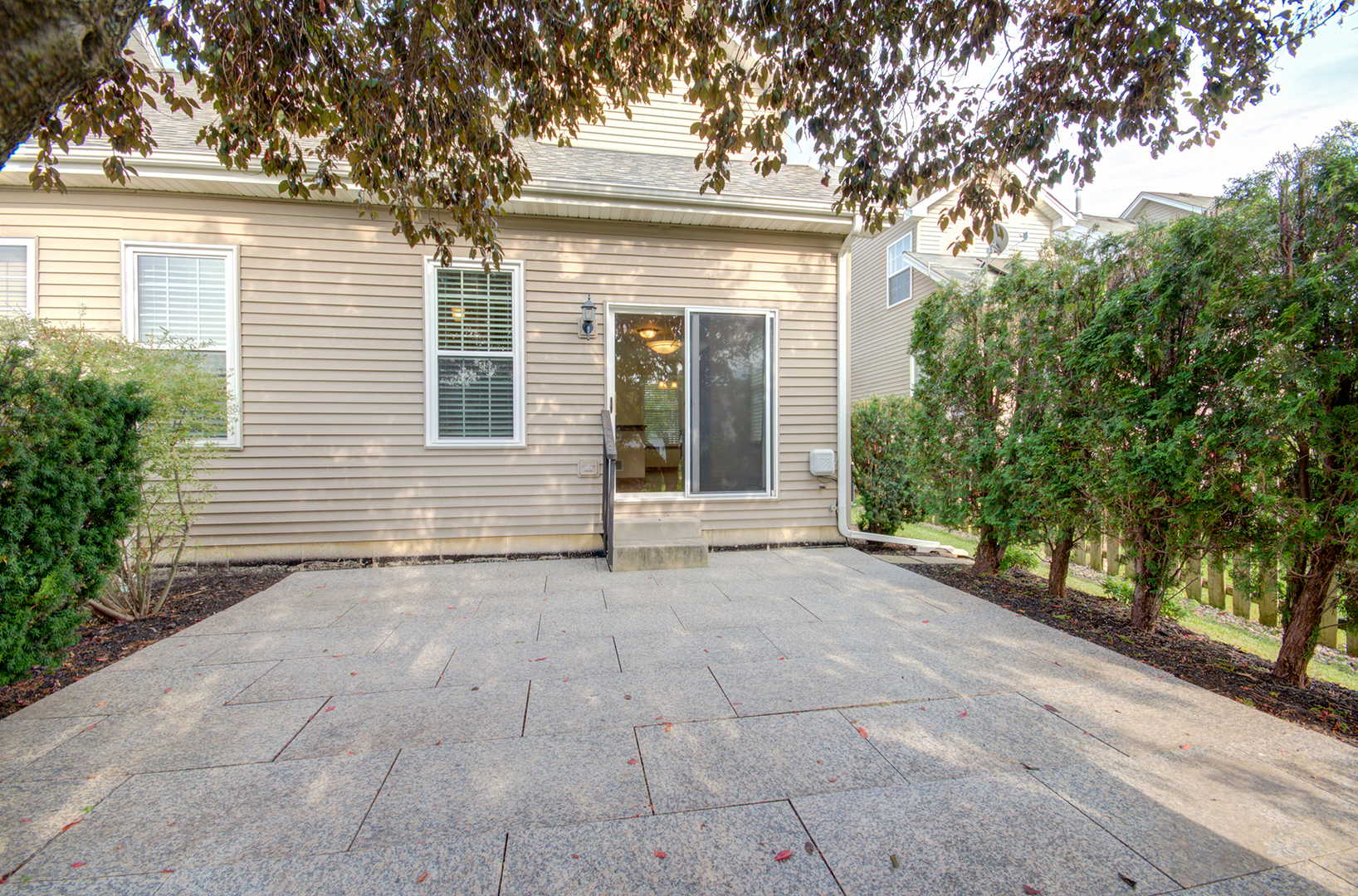 520 Frieh Drive Romeoville, IL 60446 - Photo 6 of 26 a view of a house with a yard and potted plants