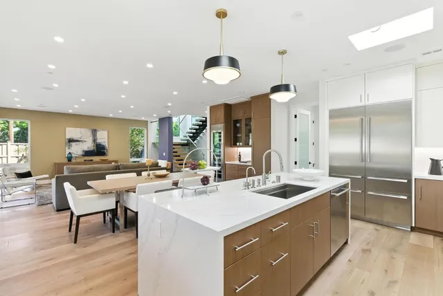 a kitchen with a counter space cabinets and appliances