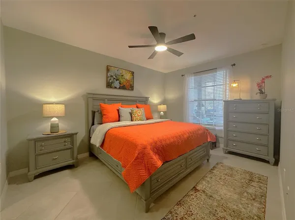 a bed room with a bed and a dresser