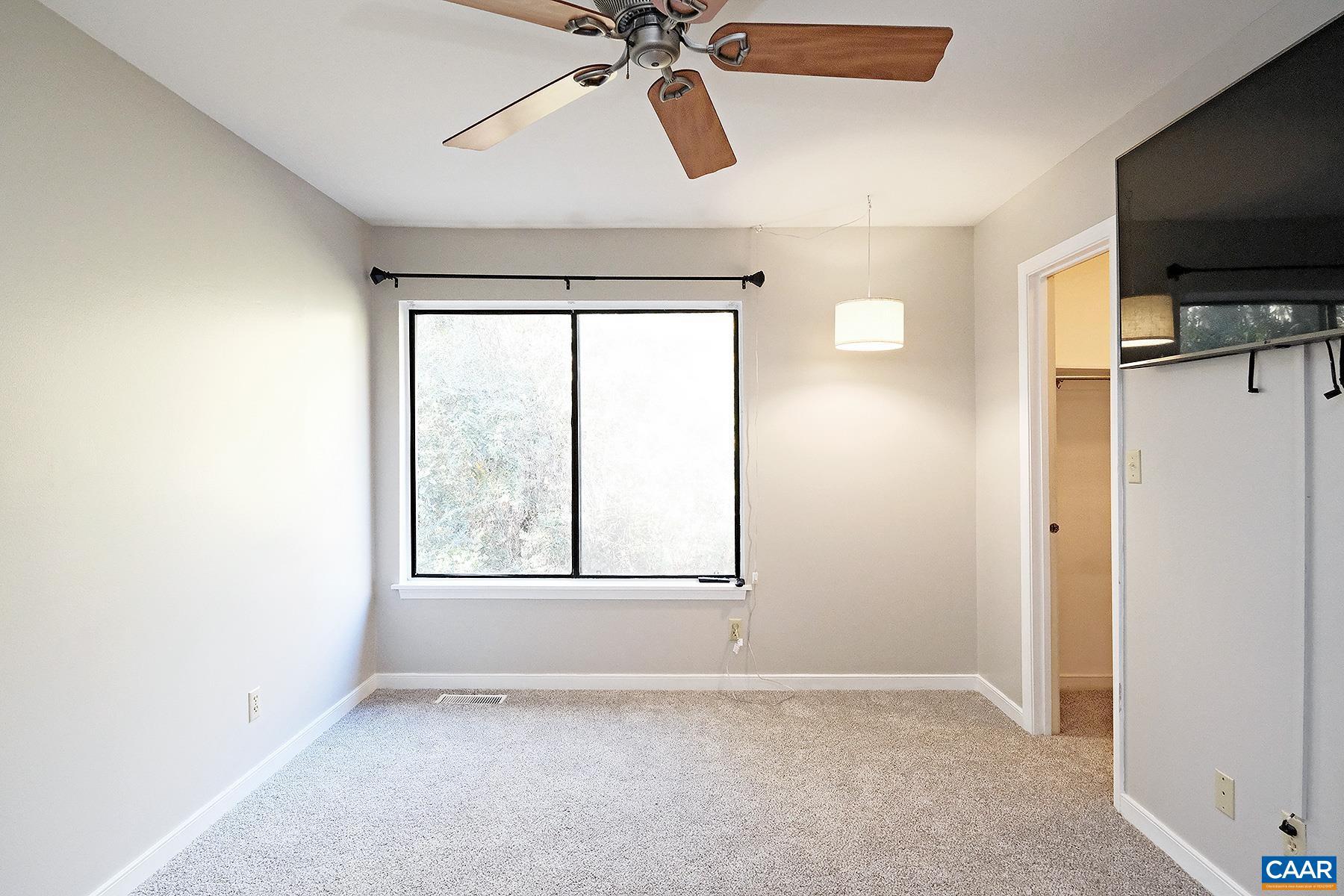 964 Sutton Court Charlottesville, VA 22901 - Photo 8 of 20 a view of an empty room with a window