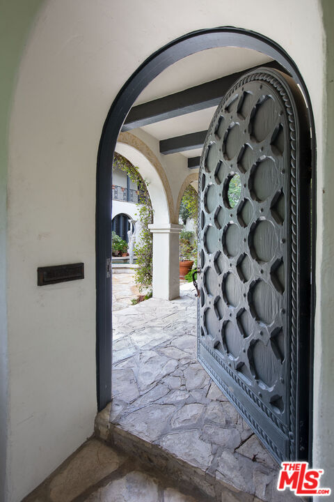 703 Walden Drive Beverly Hills, CA 90210 - Photo 3 of 22 a view of wooden door