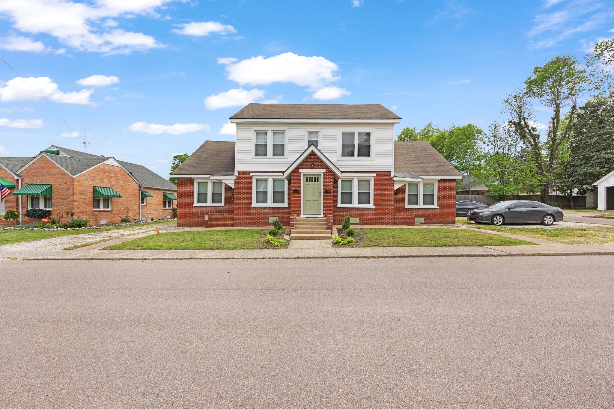116 Summer Street Martin, TN 38237 - Photo 1 of 43 a front view of residential houses with street