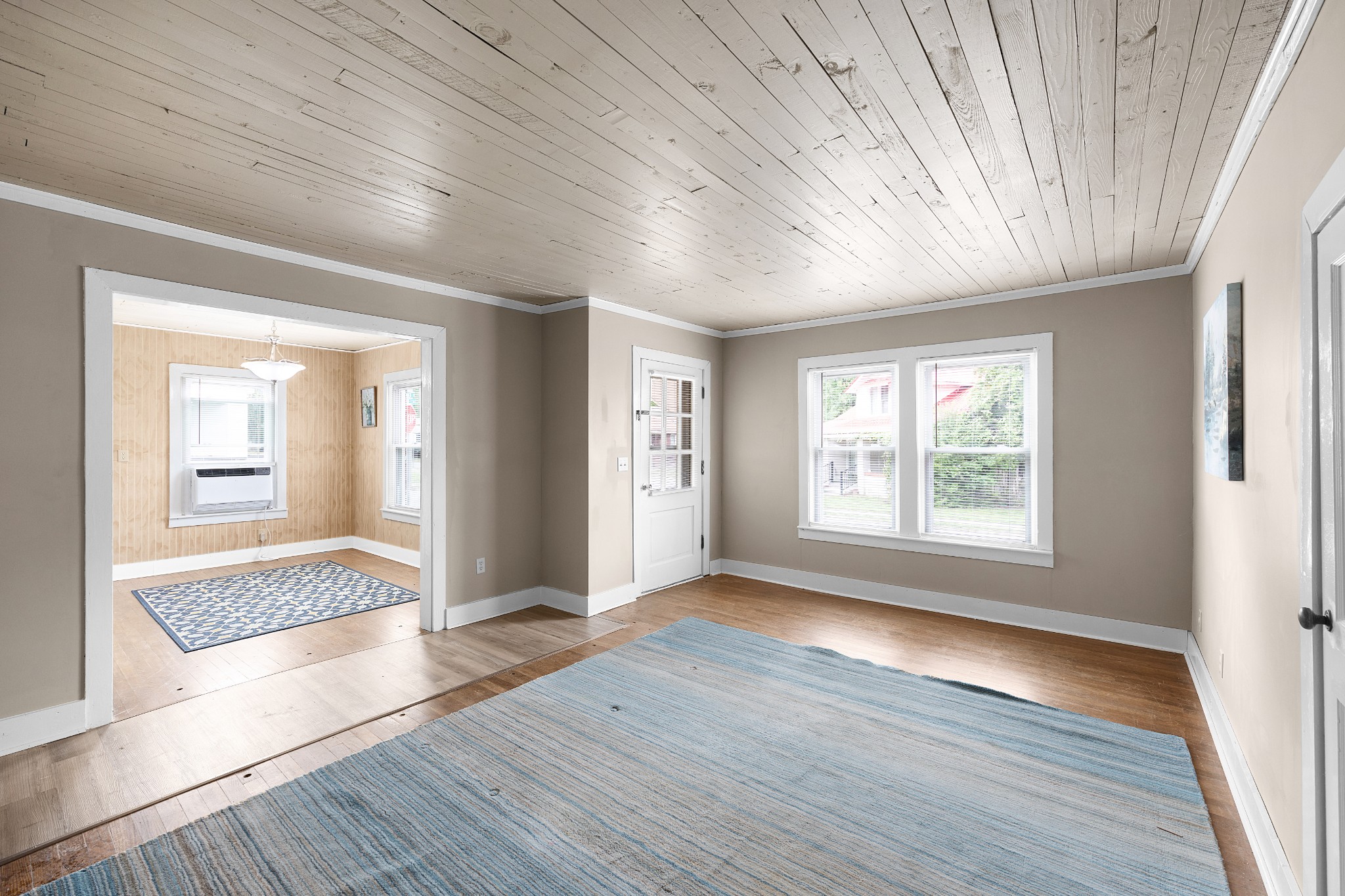 116 Summer Street Martin, TN 38237 - Photo 14 of 43 an empty room with wooden floor and windows