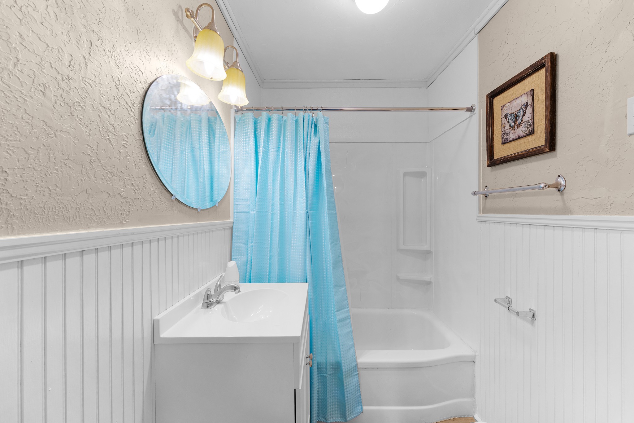 116 Summer Street Martin, TN 38237 - Photo 25 of 43 a bathroom with a sink and a mirror