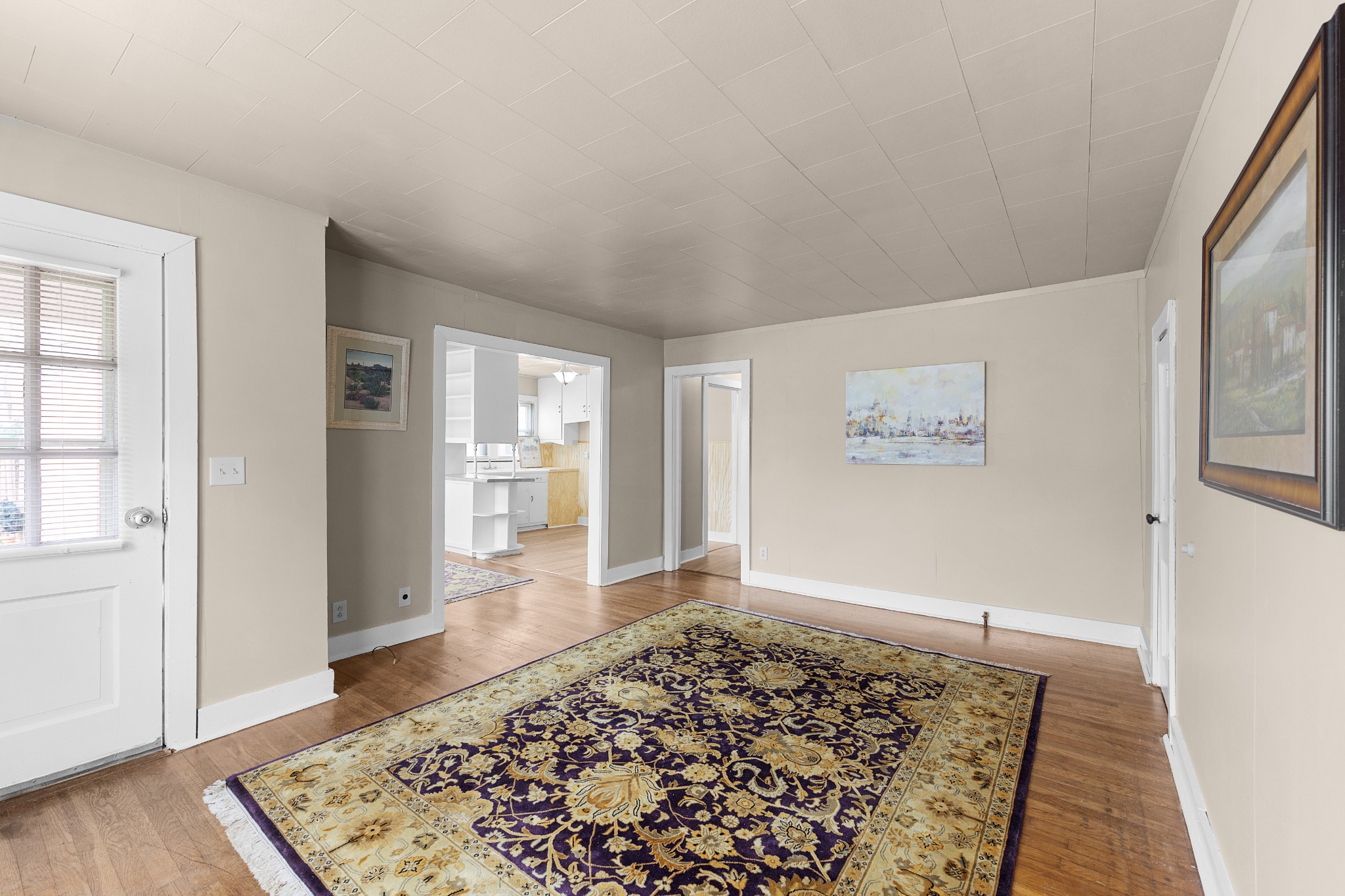 116 Summer Street Martin, TN 38237 - Photo 26 of 43 a view of a hallway with wooden floor and a rug