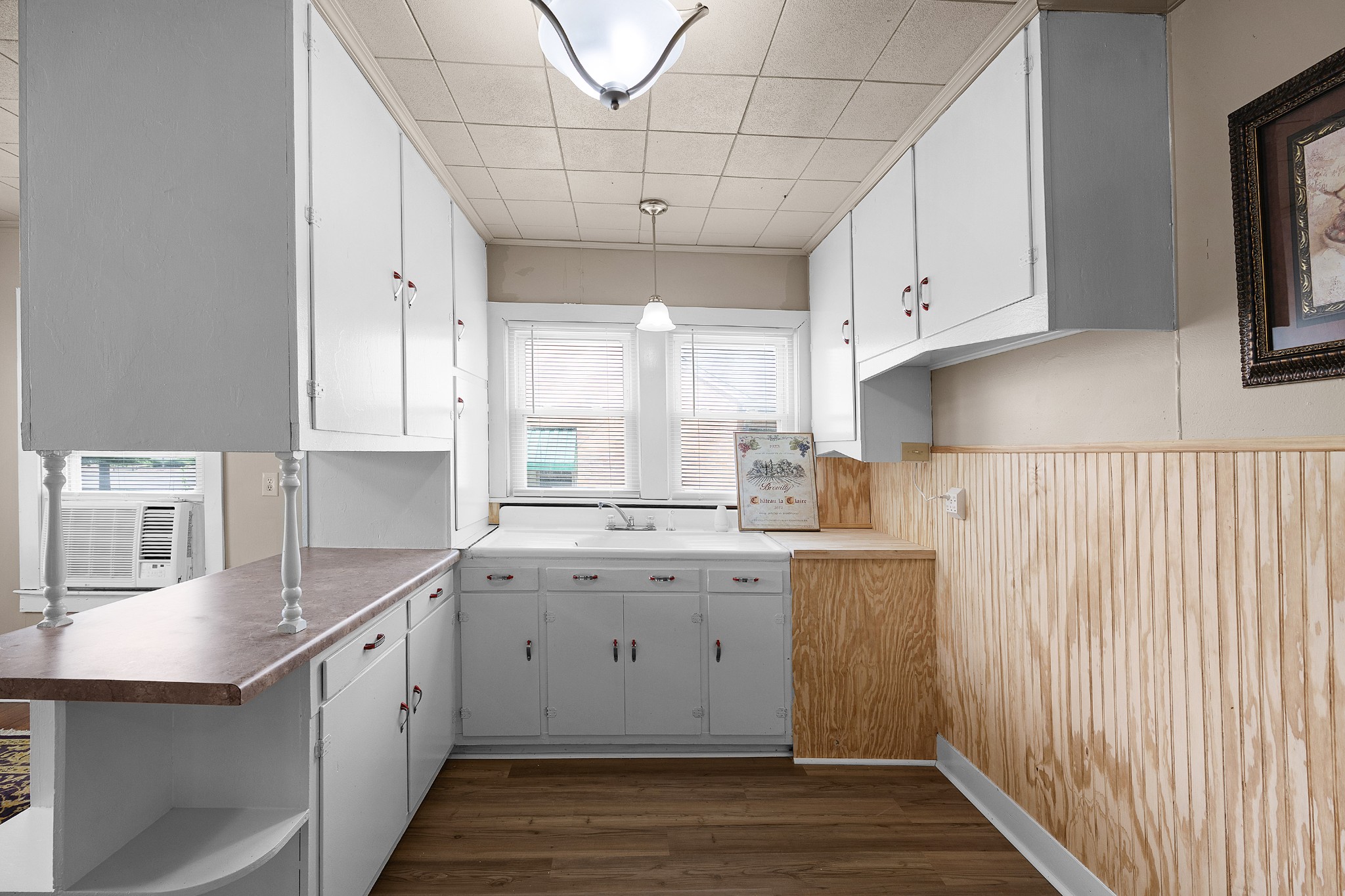 116 Summer Street Martin, TN 38237 - Photo 31 of 43 a kitchen with a sink stove and cabinets