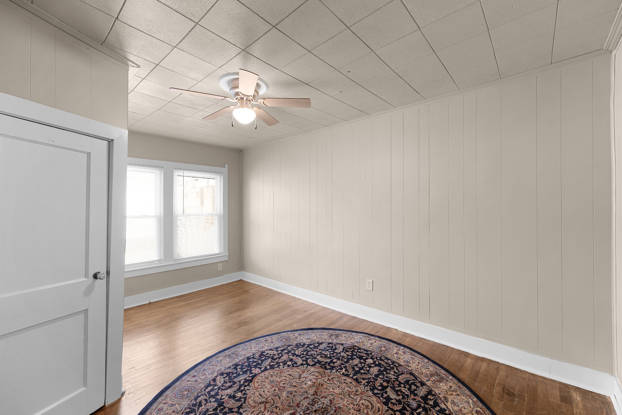 116 Summer Street Martin, TN 38237 - Photo 32 of 43 wooden floor in an empty room with a window