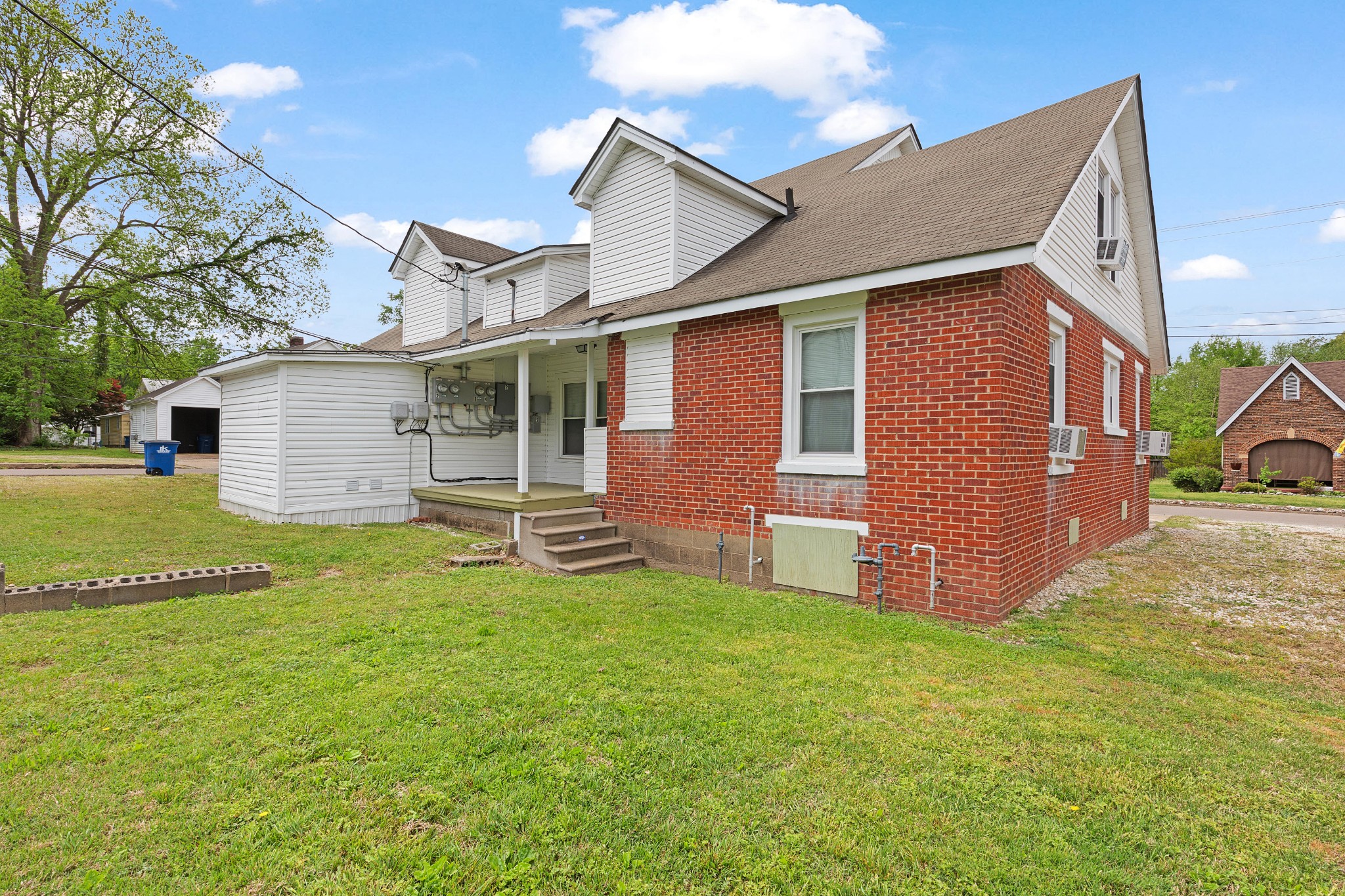 116 Summer Street Martin, TN 38237 - Photo 39 of 43 a view of a house with backyard and garden
