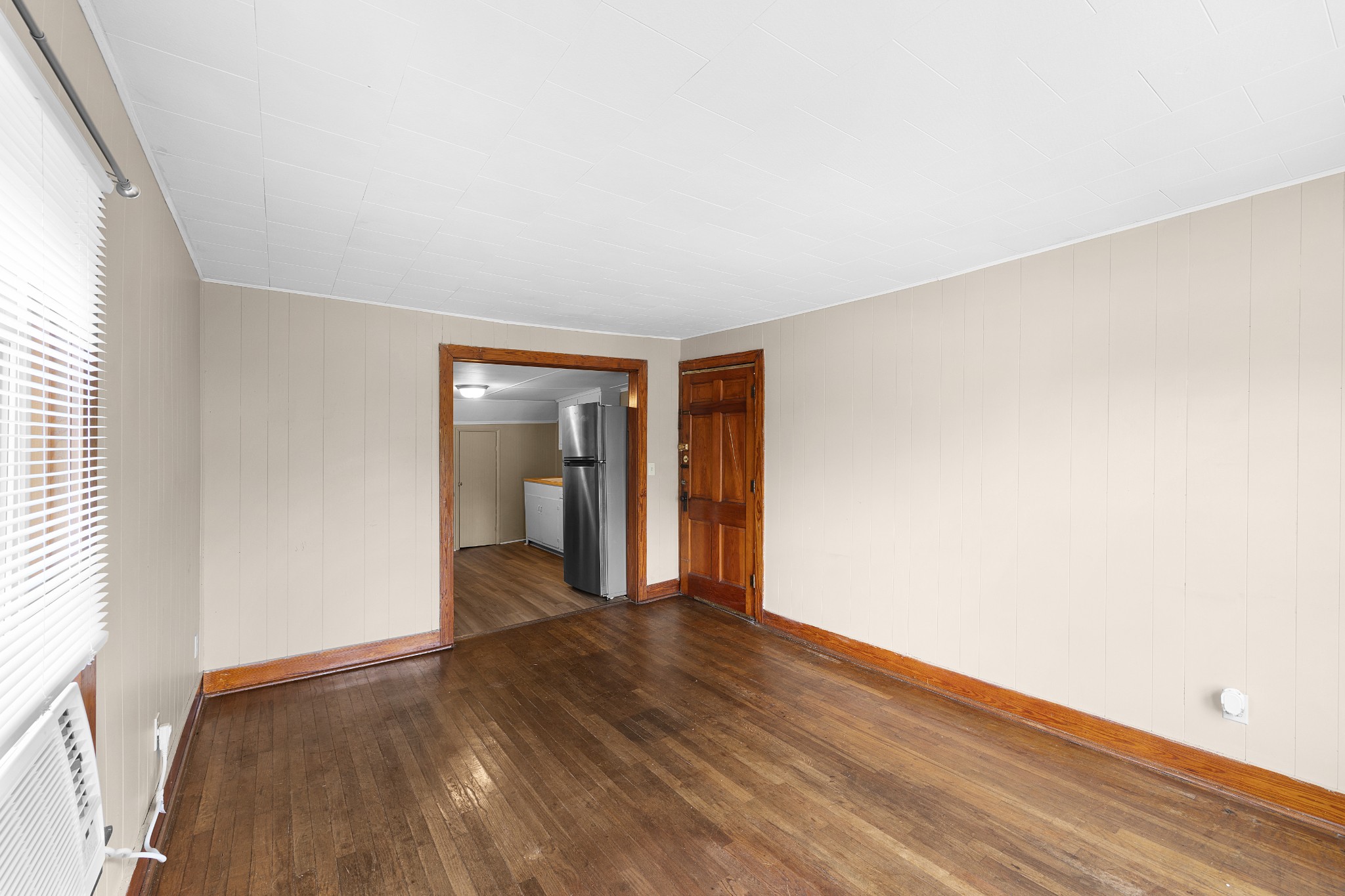 116 Summer Street Martin, TN 38237 - Photo 5 of 43 a view of wooden floor and windows in a room