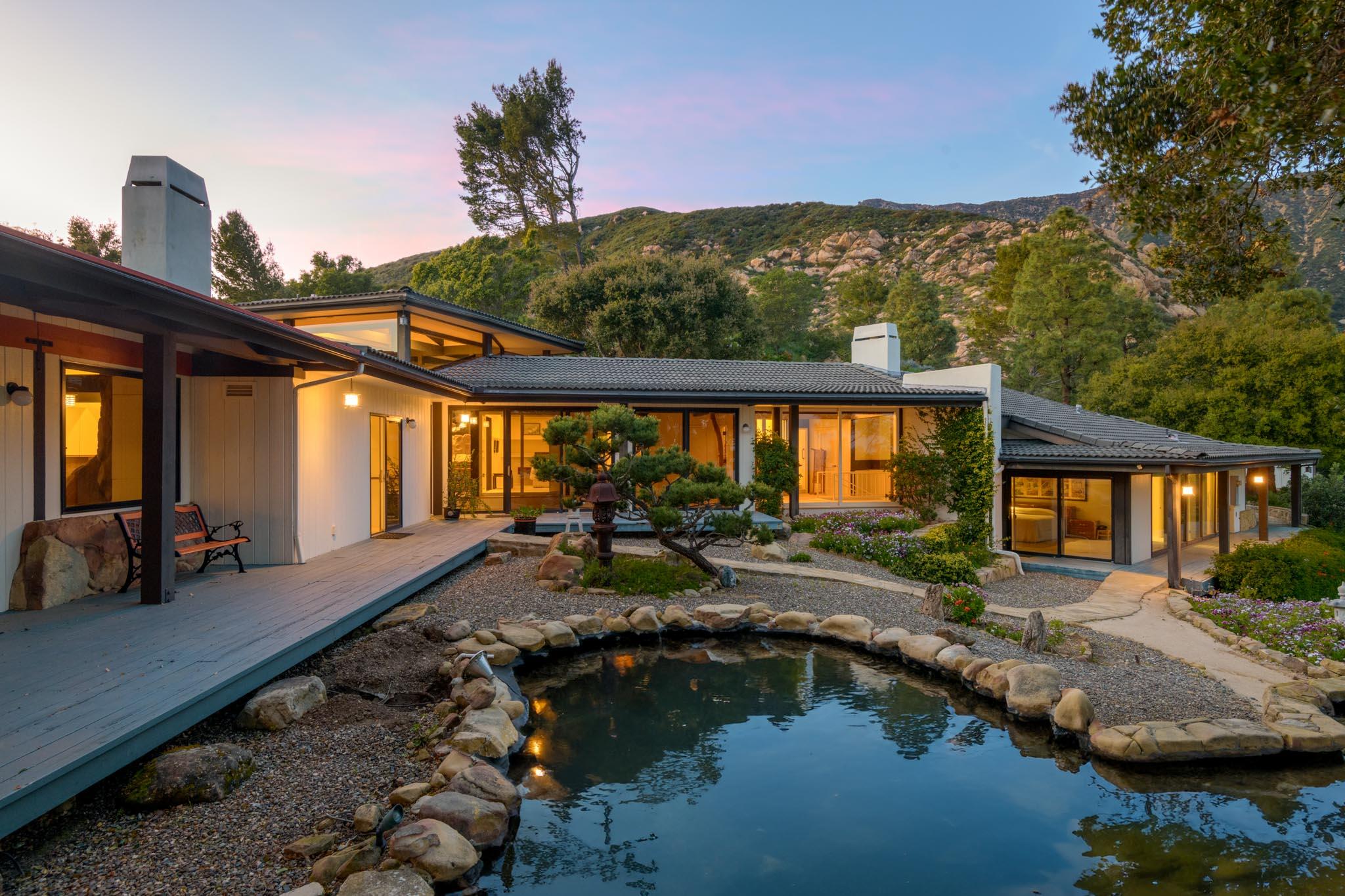 909 Park Lane Montecito, CA 93108 - Photo 13 of 39 a view of a house with swimming pool and sitting area