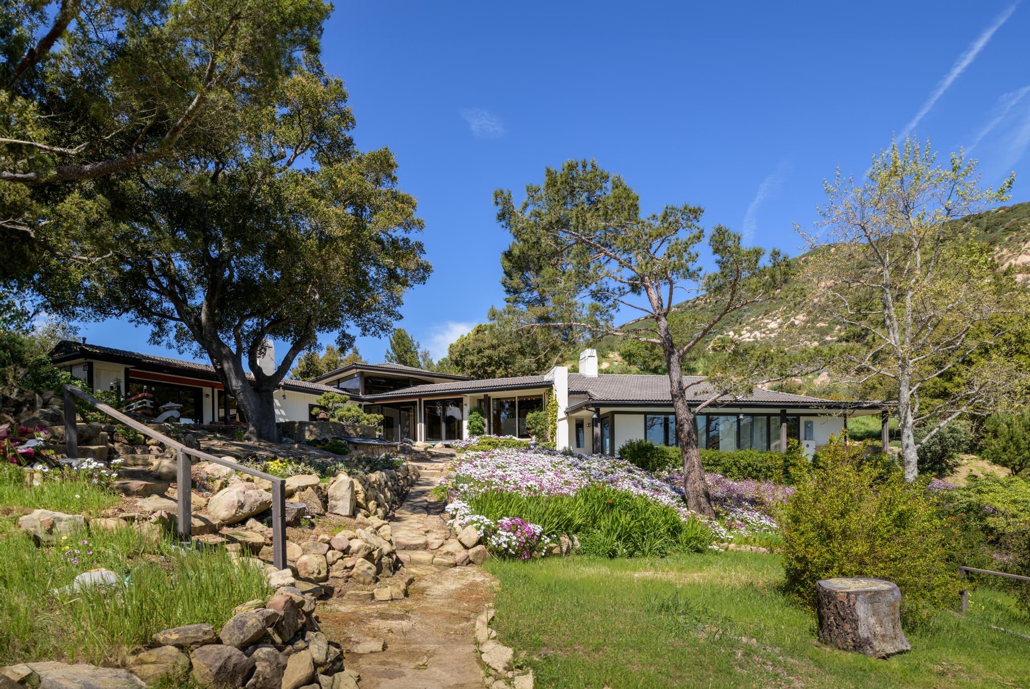 909 Park Lane Montecito, CA 93108 - Photo 16 of 39 a front view of a house with a yard