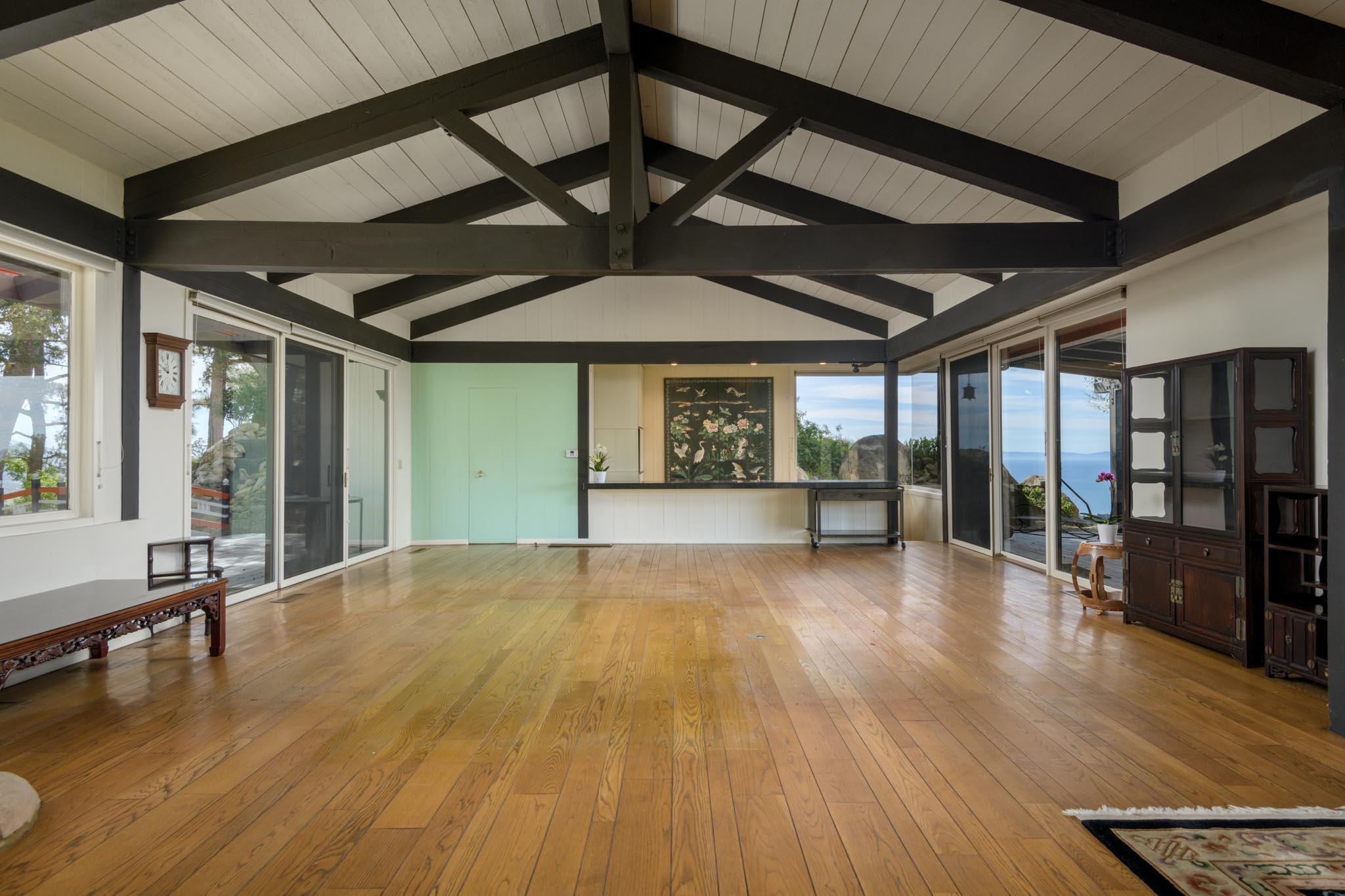 909 Park Lane Montecito, CA 93108 - Photo 27 of 39 a view of an empty room with wooden floor and a window