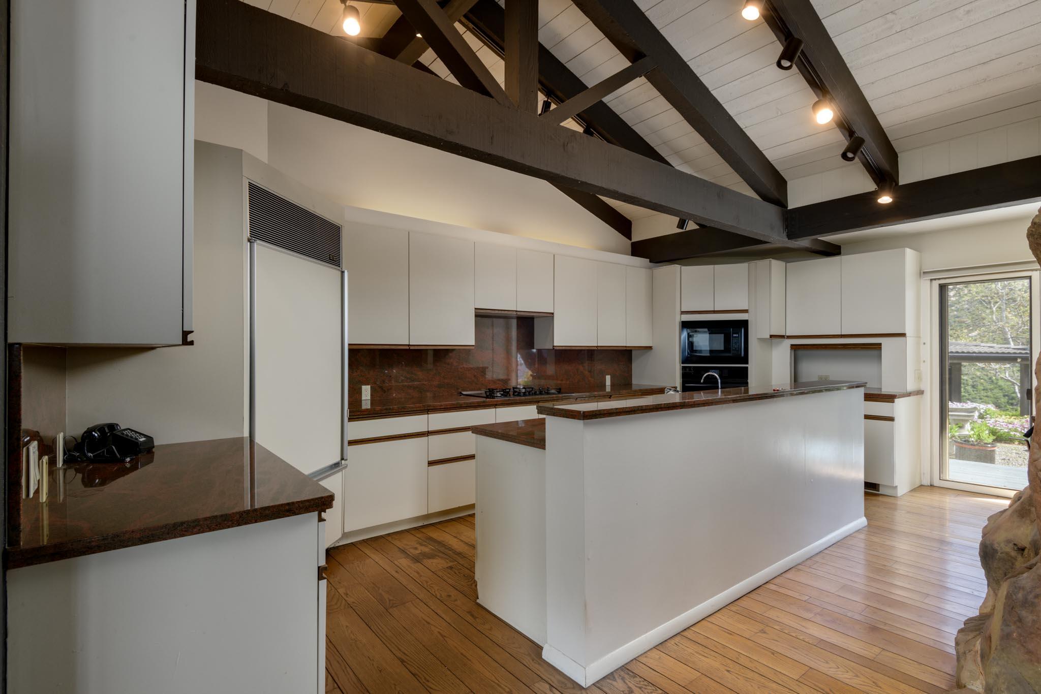 909 Park Lane Montecito, CA 93108 - Photo 28 of 39 a kitchen with stainless steel appliances a sink a stove top oven a counter space and cabinets