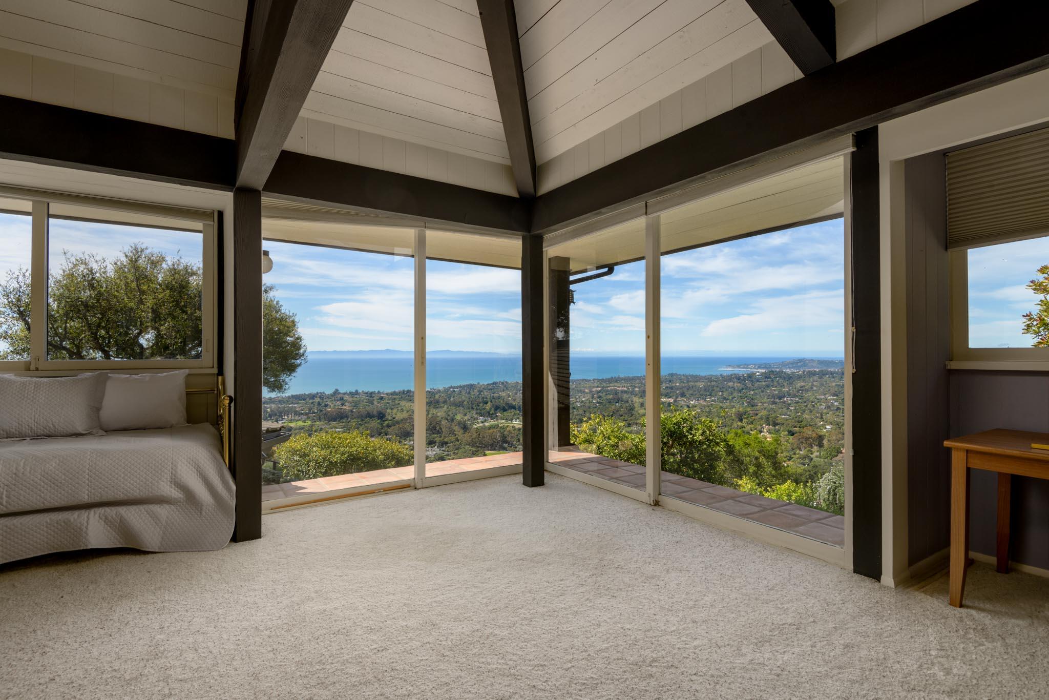 909 Park Lane Montecito, CA 93108 - Photo 33 of 39 a living room with furniture and a floor to ceiling window