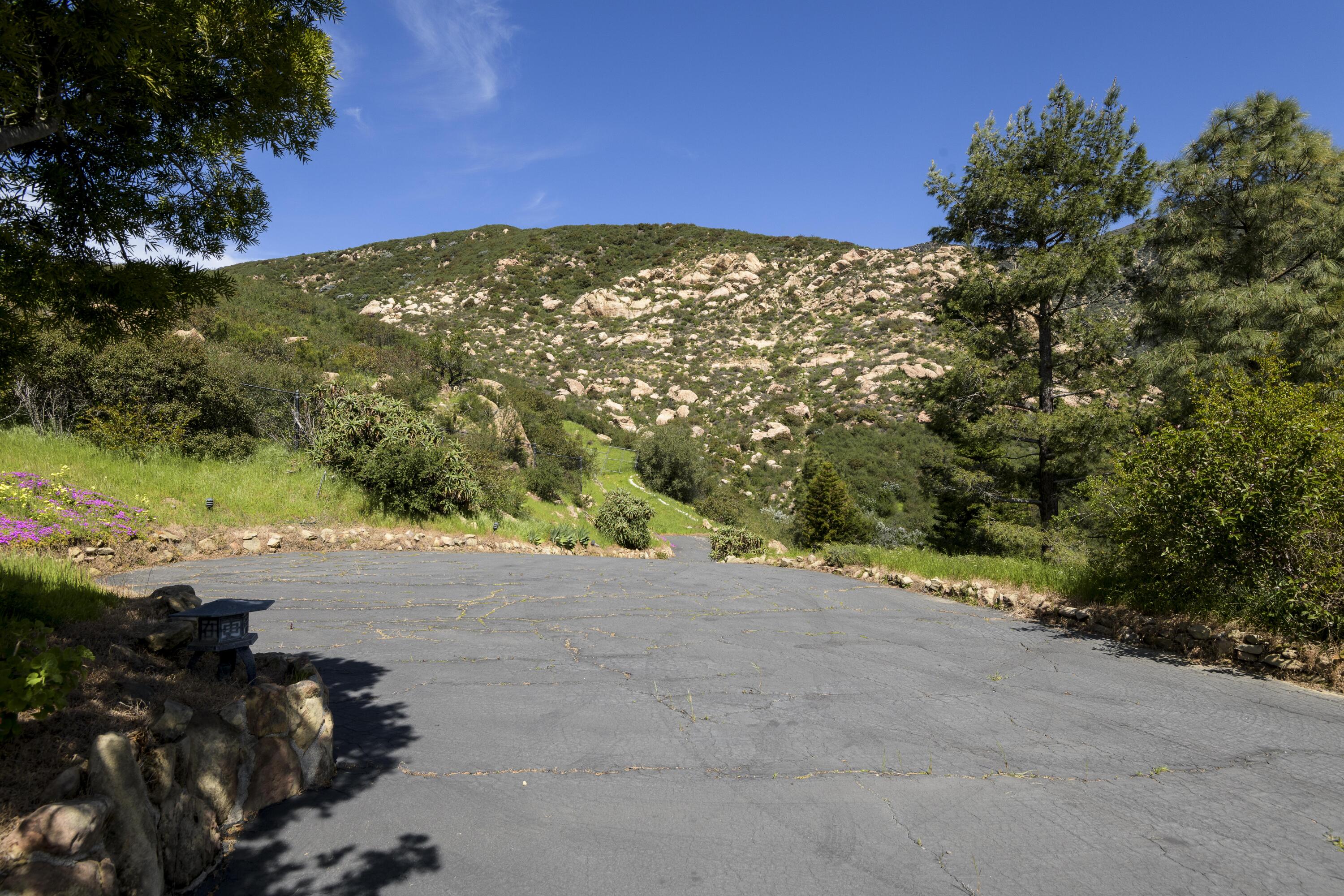 909 Park Lane Montecito, CA 93108 - Photo 36 of 39 a view of a field with a tree in the background
