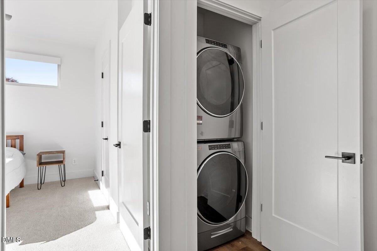 603 North Queen Street Durham, NC 27701 - Photo 34 of 40 a view of a hallway with washer and dryer