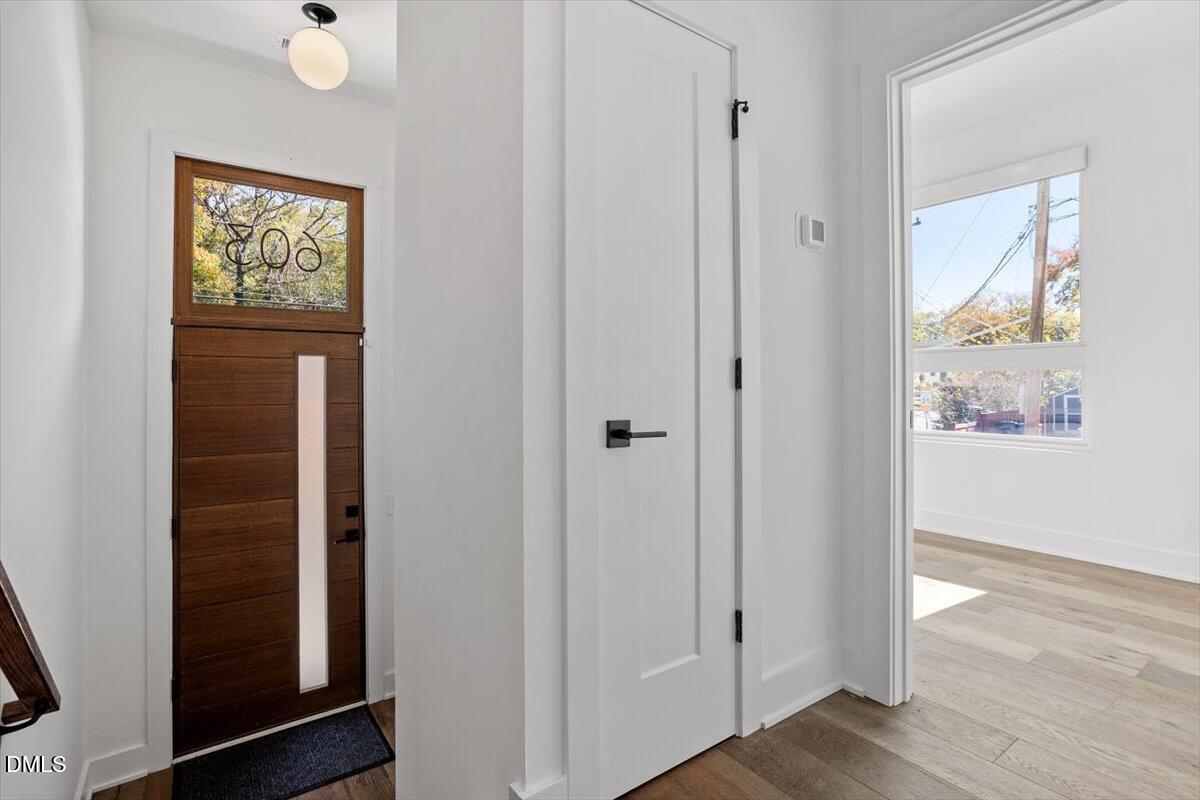 603 North Queen Street Durham, NC 27701 - Photo 4 of 40 a view of front door with wooden floor