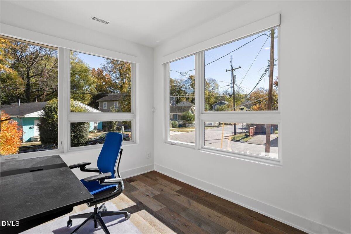 603 North Queen Street Durham, NC 27701 - Photo 6 of 40 a view of a workspace with furniture and a window