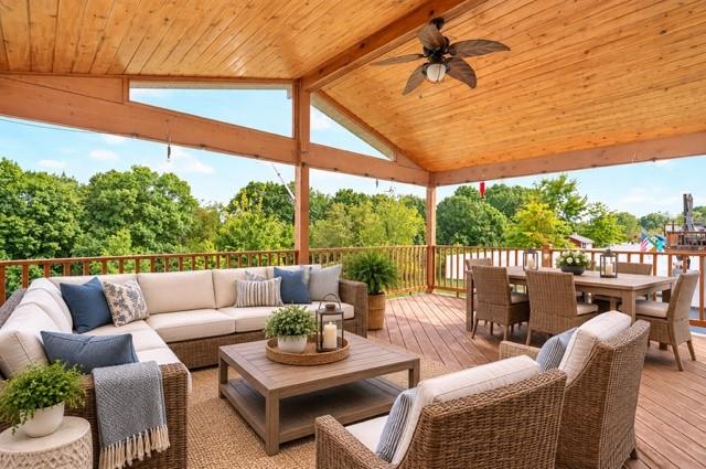 505 Blue Ridge Drive Coraopolis, PA 15108 - Photo 38 of 49 Step outside to the beautiful covered wood deck, featuring soaring vaulted wood ceilings that create a warm, inviting outdoor living space.