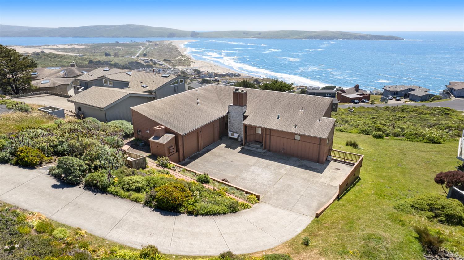21 Maui Lane Dillon Beach, CA 94929 - Photo 1 of 1 an aerial view of residential houses with outdoor space and ocean view
