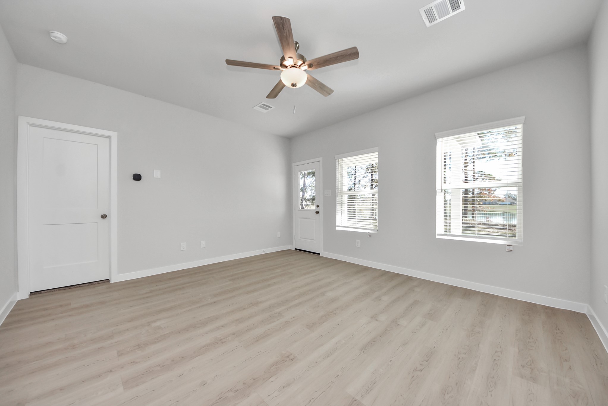 473 Shoreview Drive Conroe, TX 77303 - Photo 29 of 49 a view of an empty room with a window