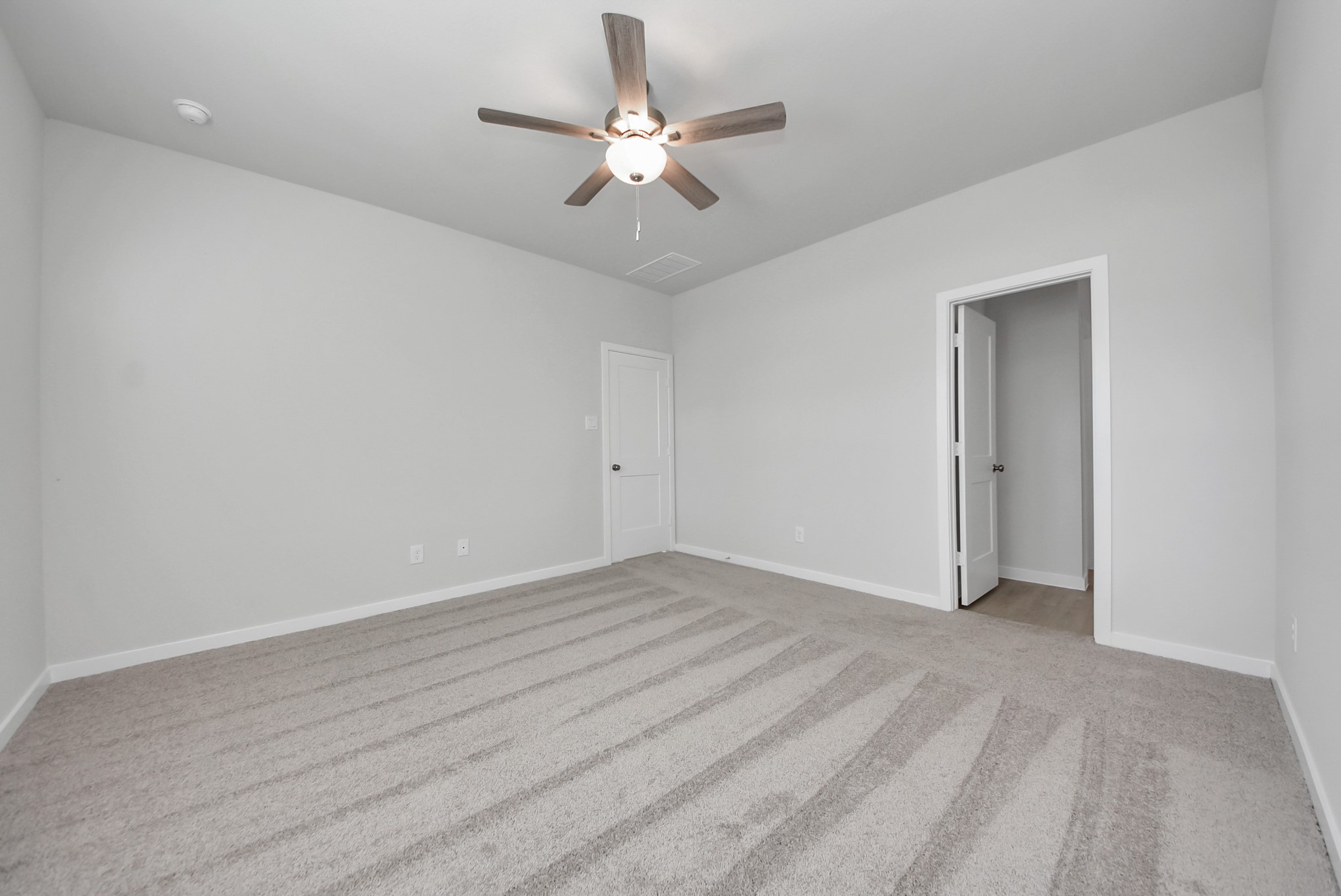 473 Shoreview Drive Conroe, TX 77303 - Photo 33 of 49 wooden floor in an empty room