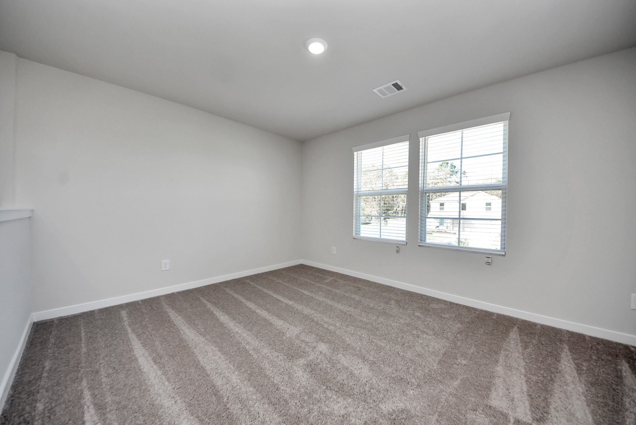 473 Shoreview Drive Conroe, TX 77303 - Photo 39 of 49 an empty room with a window