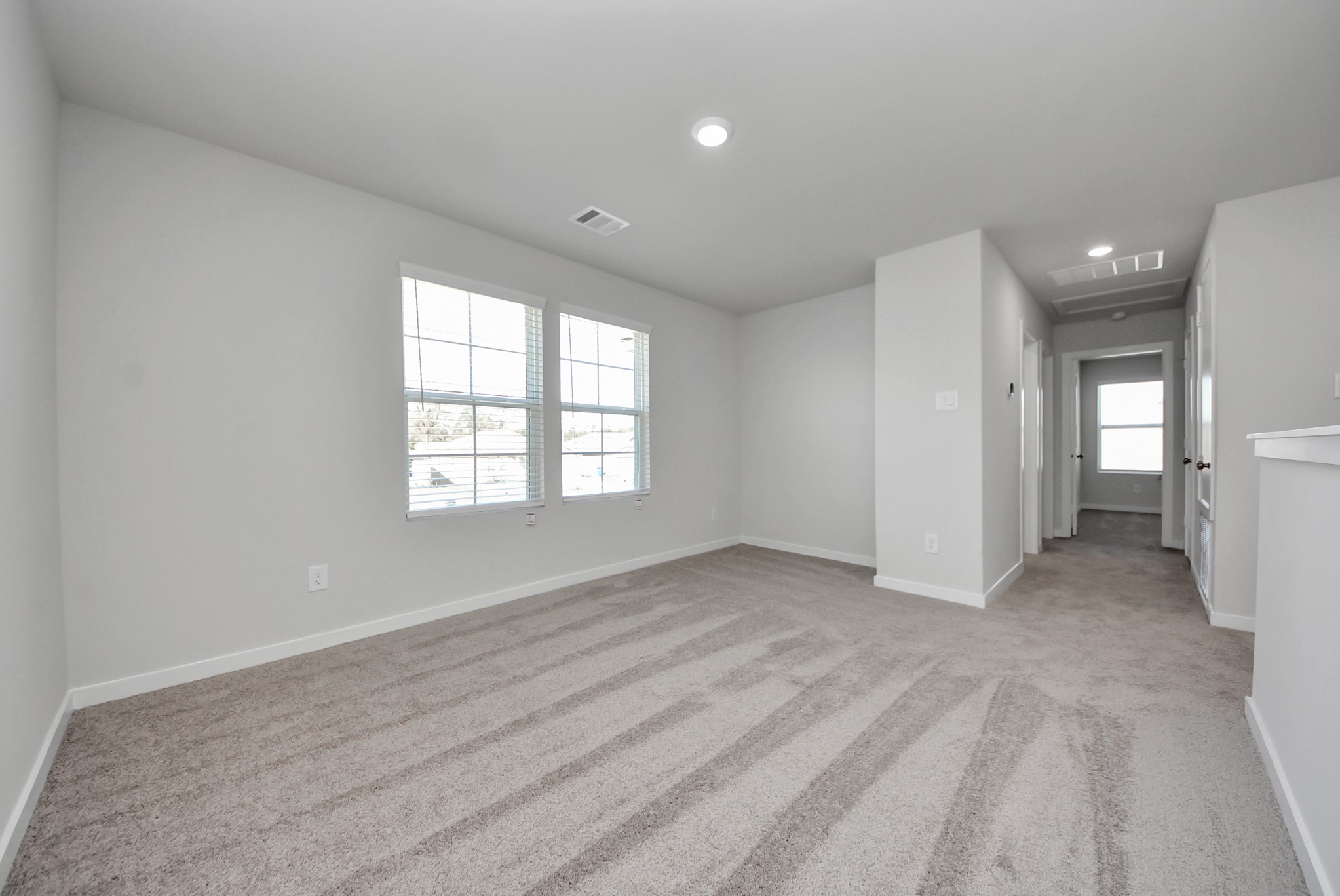 473 Shoreview Drive Conroe, TX 77303 - Photo 41 of 49 wooden floor in an empty room with a window