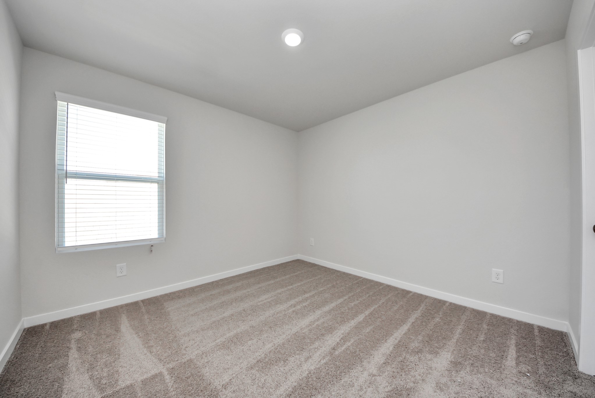 473 Shoreview Drive Conroe, TX 77303 - Photo 42 of 49 an empty room with a window