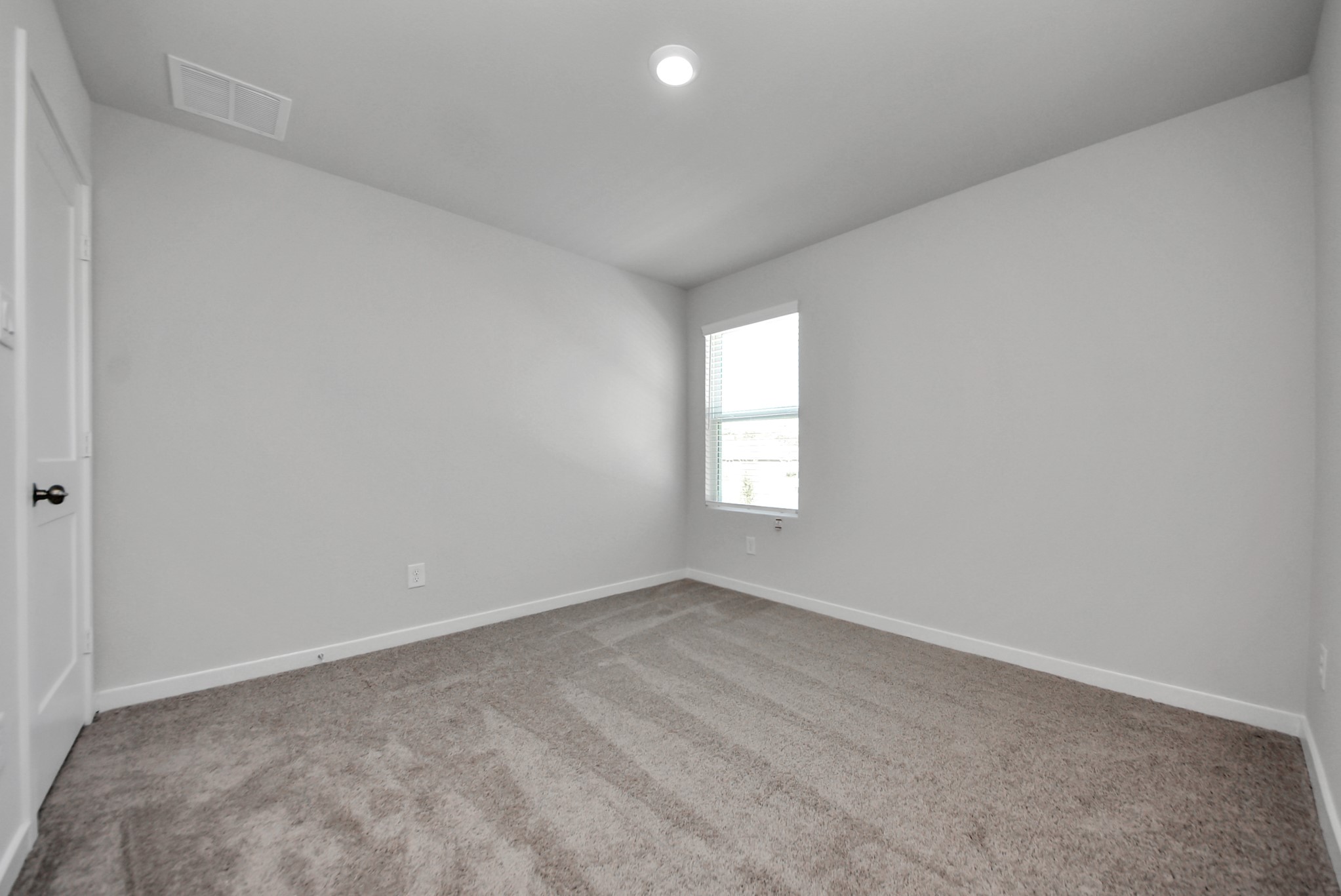 473 Shoreview Drive Conroe, TX 77303 - Photo 44 of 49 an empty room with windows