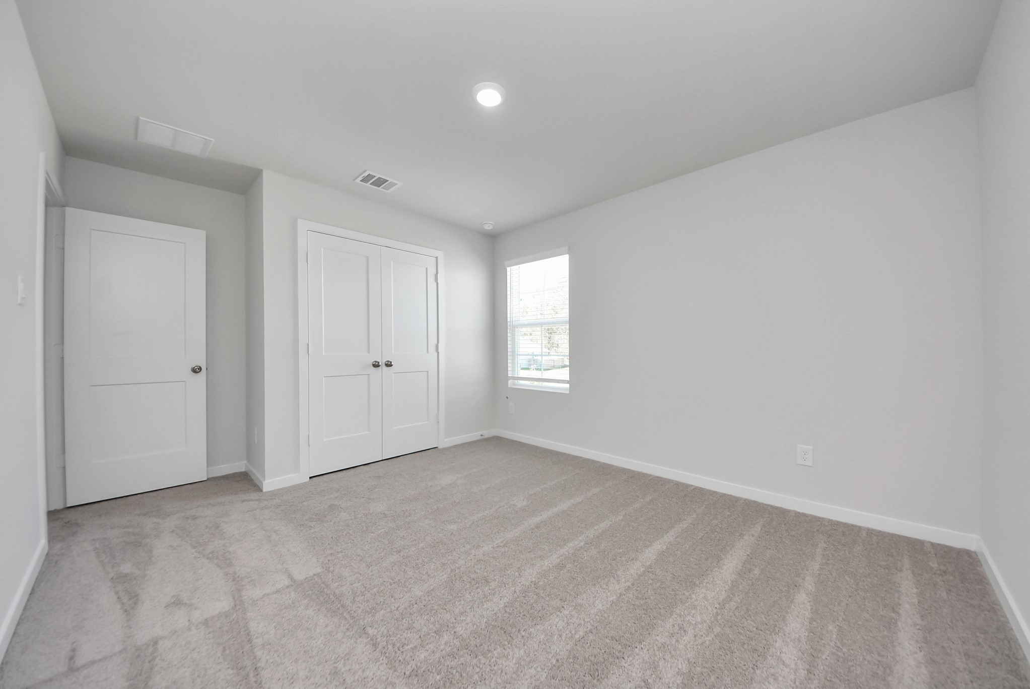 473 Shoreview Drive Conroe, TX 77303 - Photo 46 of 49 a view of an empty room with a window