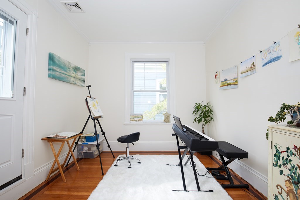 92 Coolidge Street, Unit 2 Brookline, MA 02446 - Photo 11 of 29 a workspace room with furniture and wooden floor